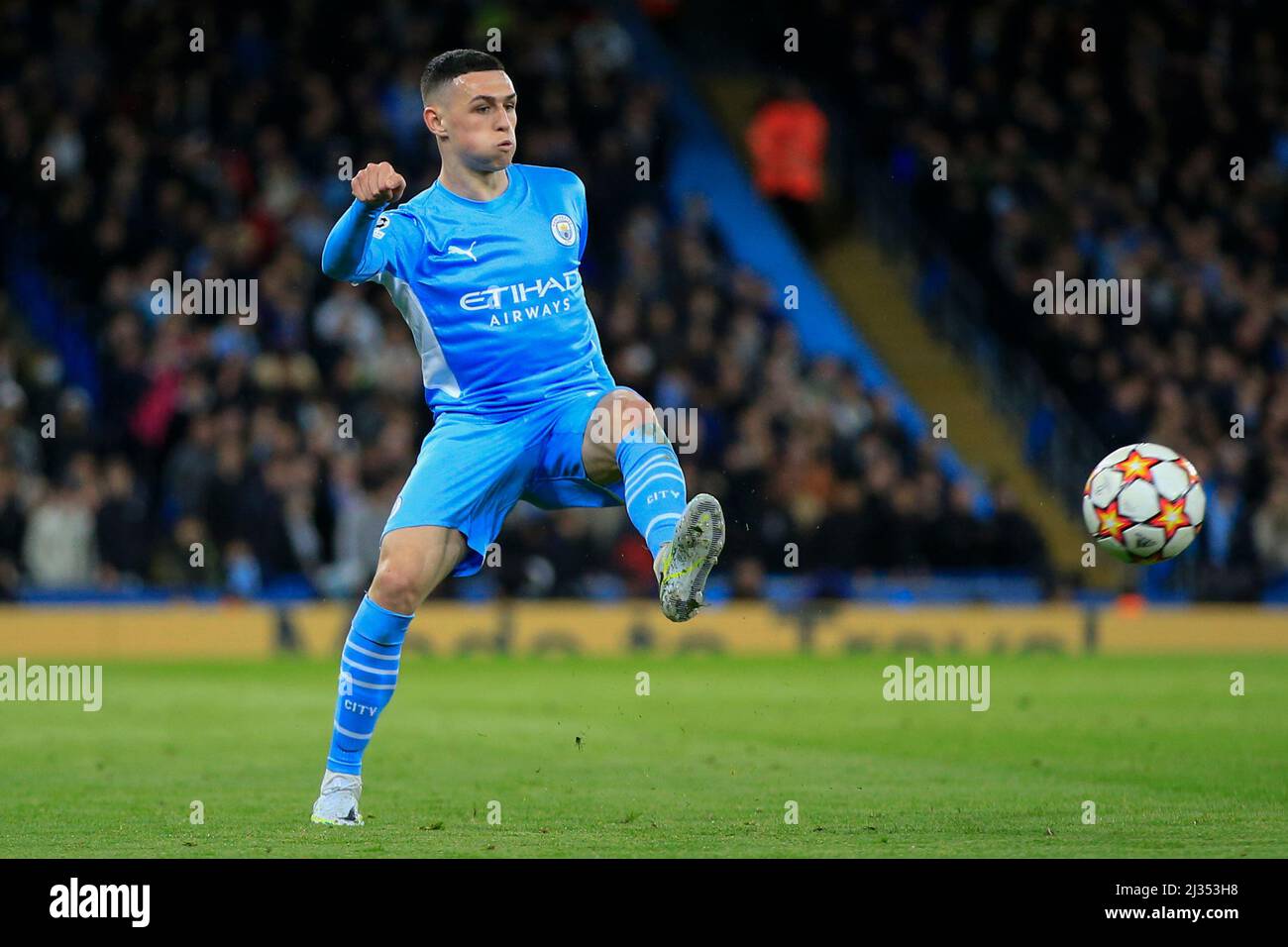 Phil Foden #47 of Manchester City passes the ball Stock Photo