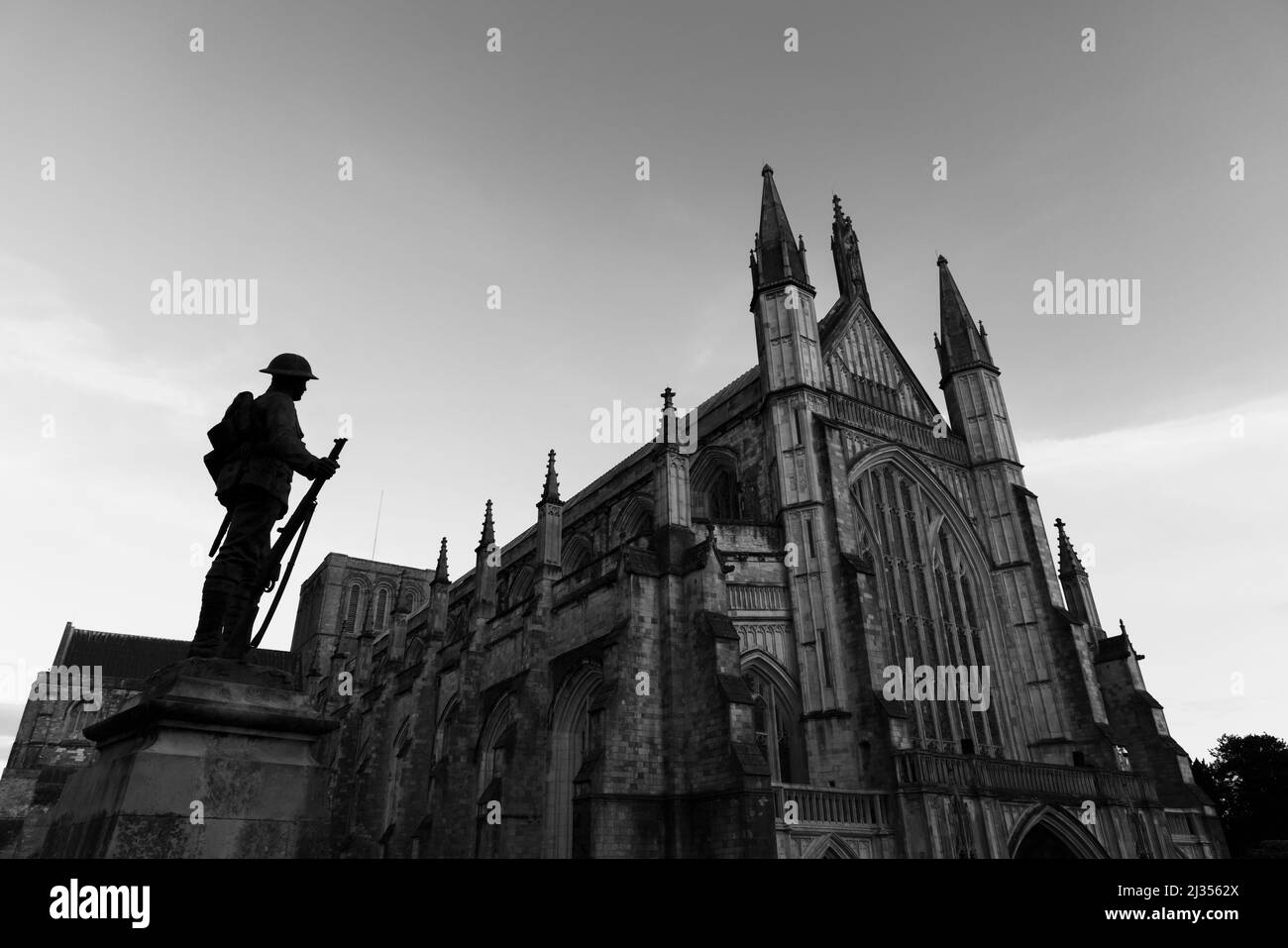 Commemorative memorial bronze statue of a rifleman of The King's Royal Rifle Corps by Winchester Cathedral in Cathedral Close, Winchester, Hampshire Stock Photo