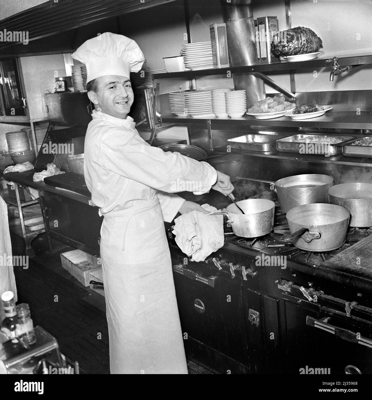 Chef in North Beach Italian restaurant, San Francisco, California, USA, John Collier, Jr.,  U.S. Office of War Information/U.S. Farm Security Administration, December 1941 Stock Photo