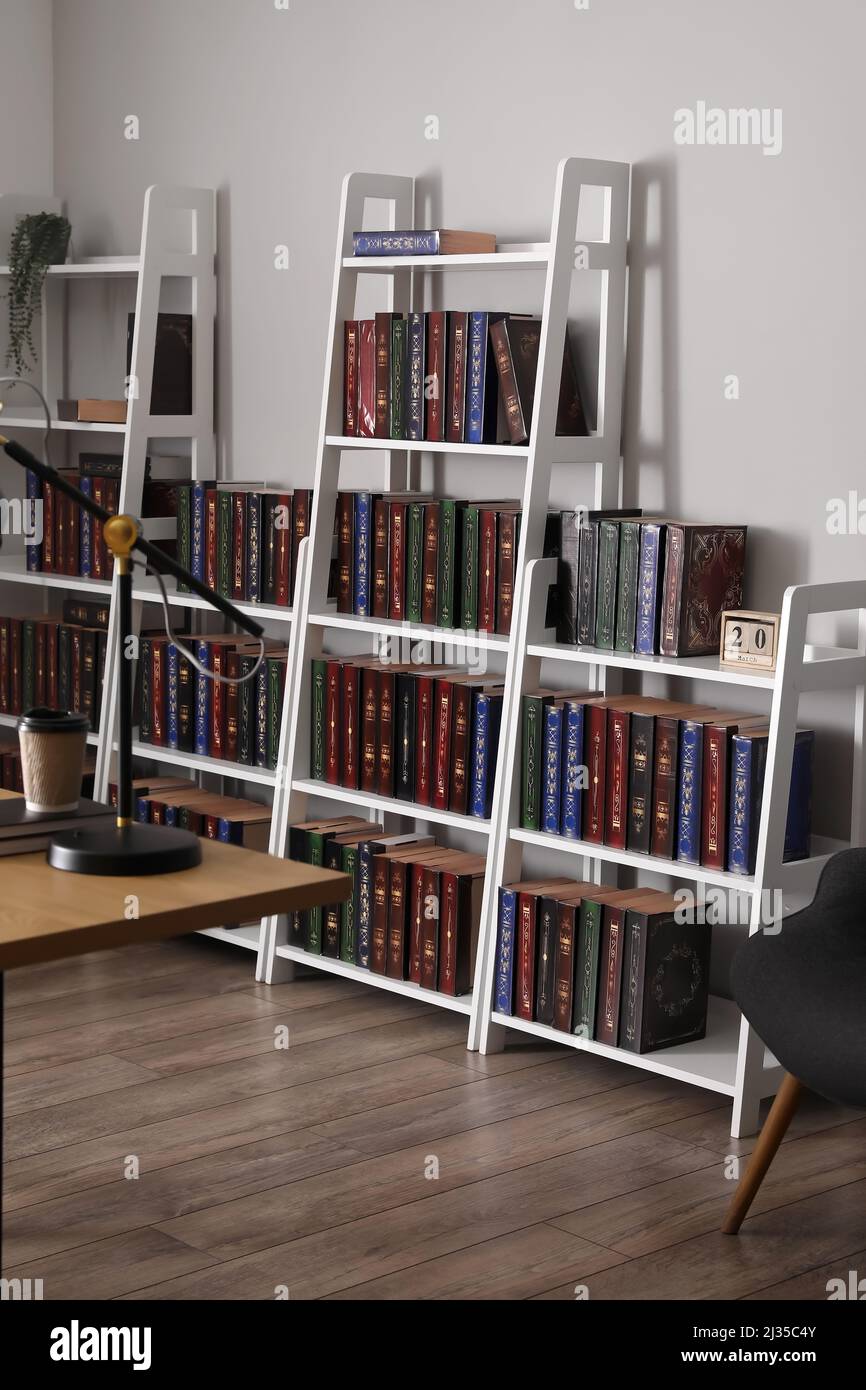 Modern shelf unit with books in home library Stock Photo Alamy