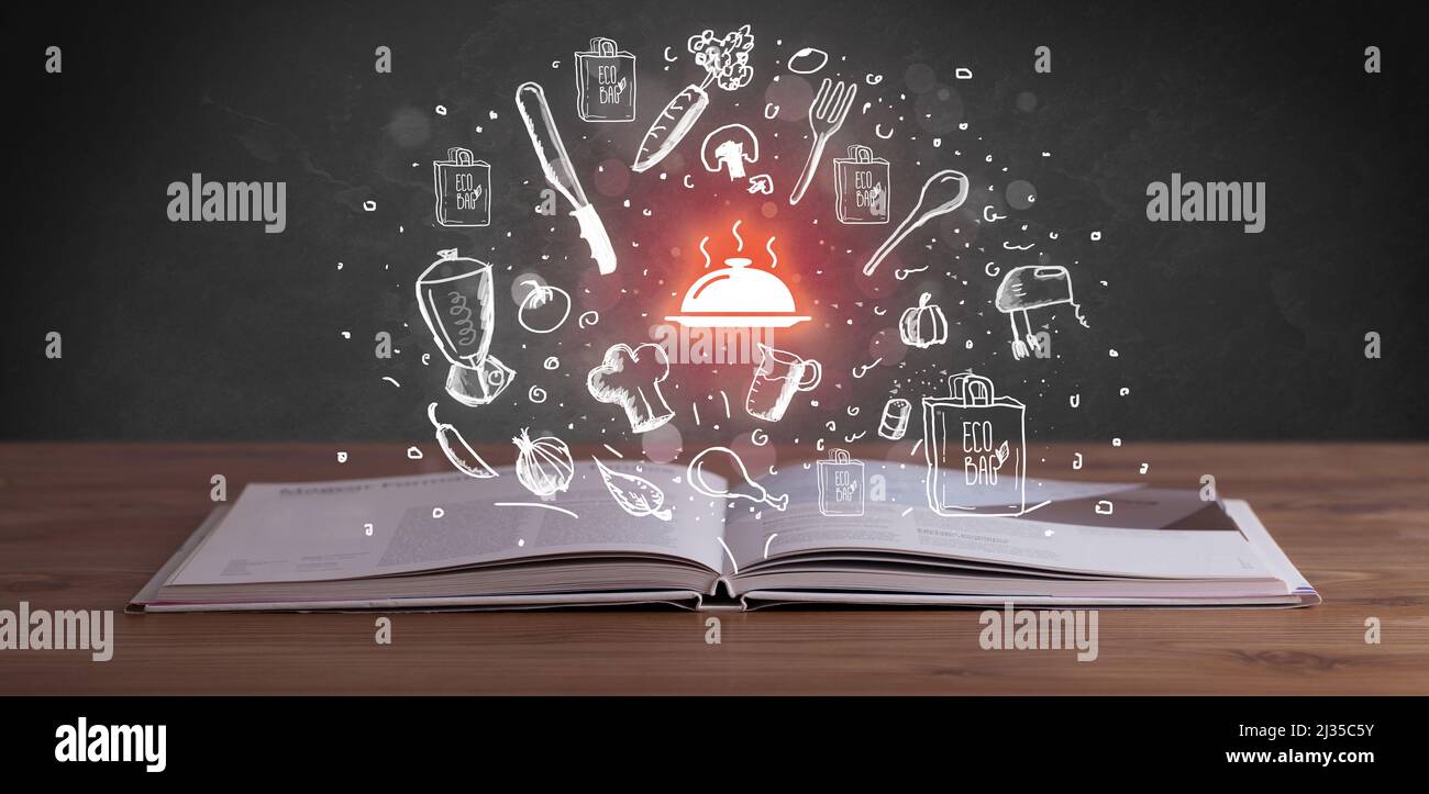 Open recipe book with food related icons above Stock Photo