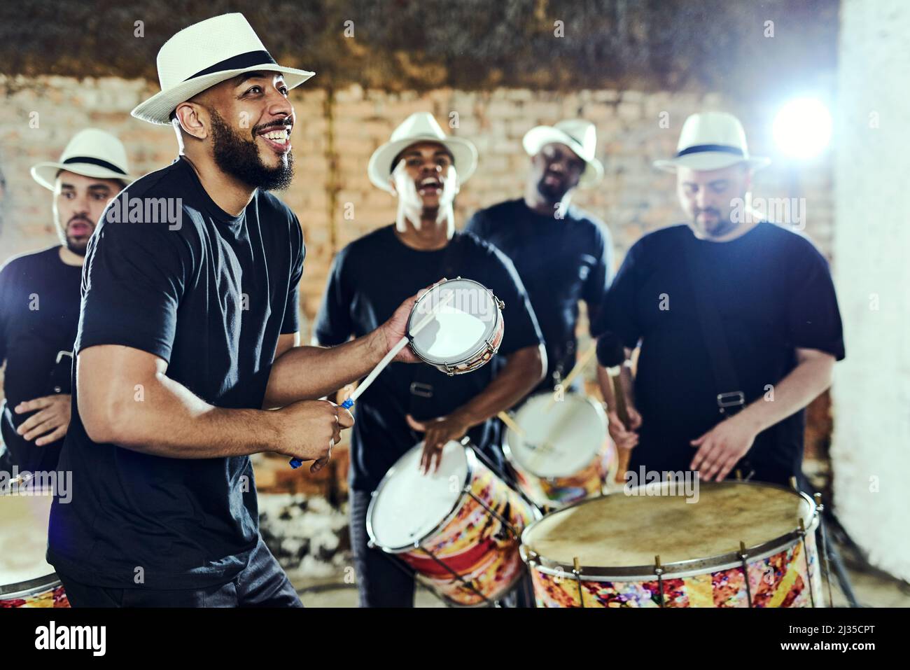 Playing african drums hi-res stock photography and images - Alamy