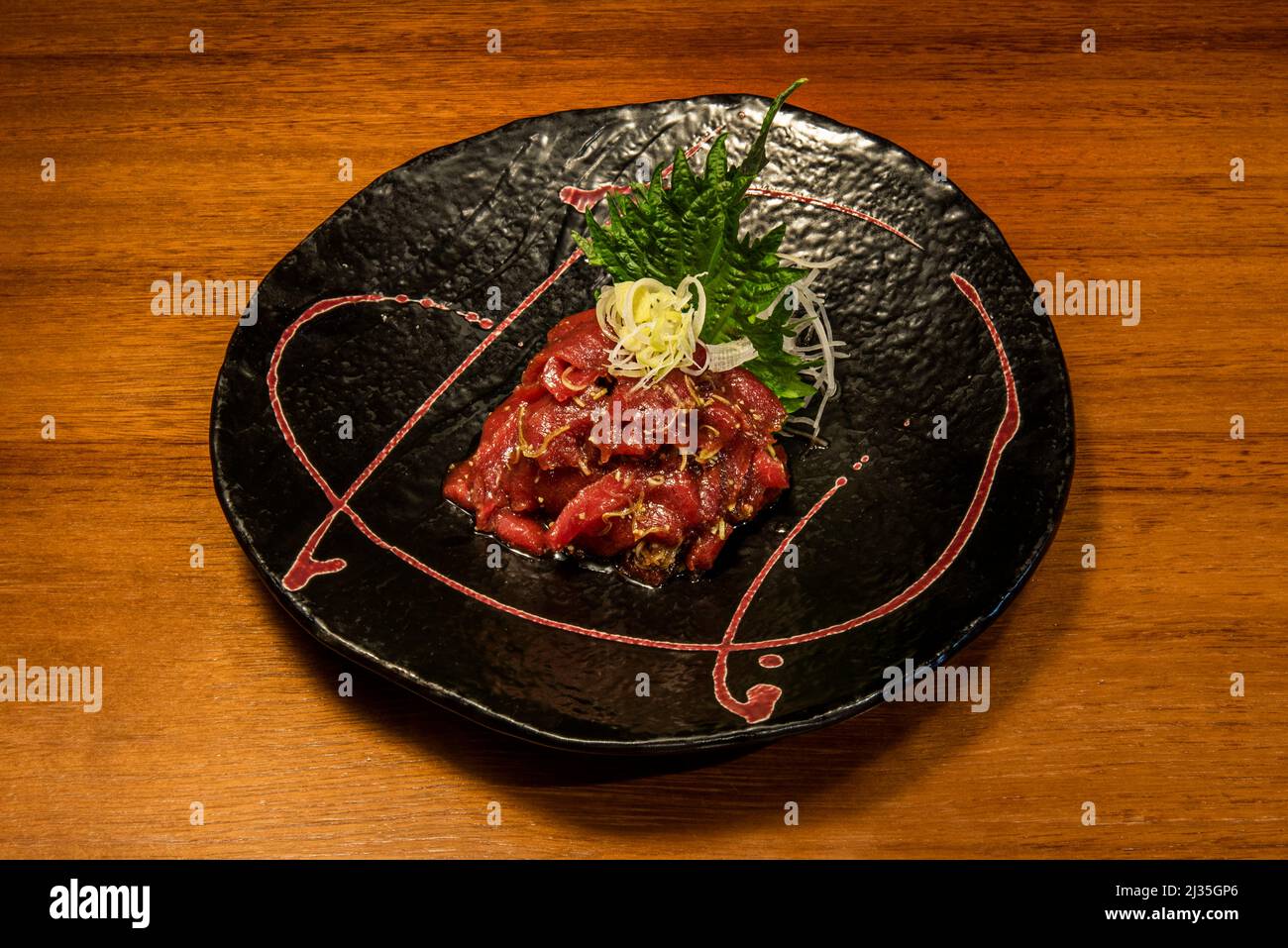 Red tuna tartar with white truffle oil Stock Photo Alamy