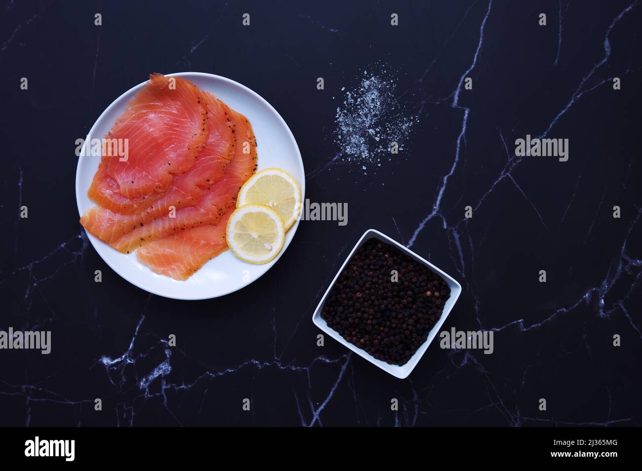 Salmon fillet black background hi-res stock photography and images - Alamy