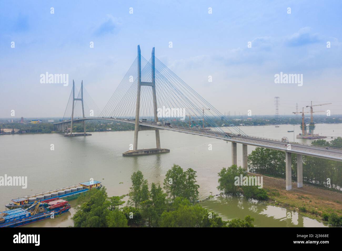 Aerial view of My Thuan bridge, cable-stayed bridge connecting the provinces of Tien Giang and Vinh Long, Vietnam. Famous beautiful bridge of Mekong D Stock Photo