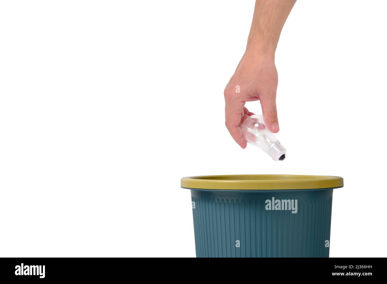 Disposal and disposal in the trash old burnt out incandescent lamp