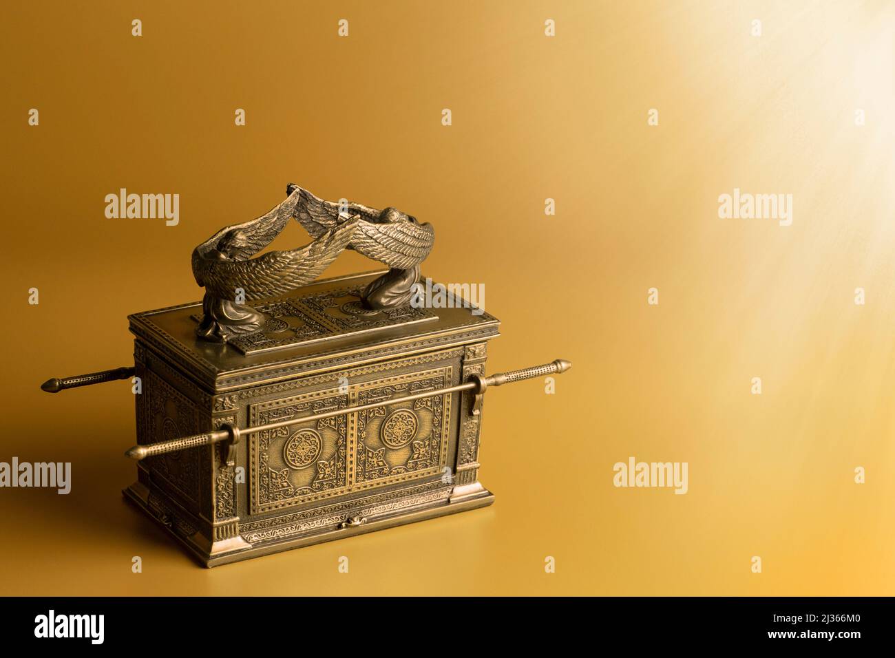 The Ark of the Covenant on a Gold Background Stock Photo