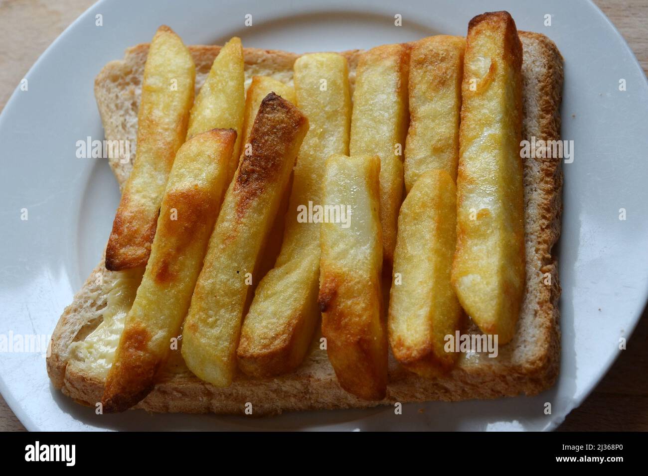 chip sandwich, chip butty, fast food Stock Photo Alamy
