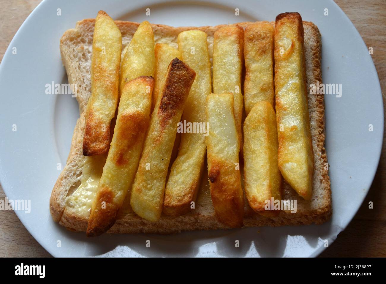 chip sandwich, chip butty, fast food Stock Photo