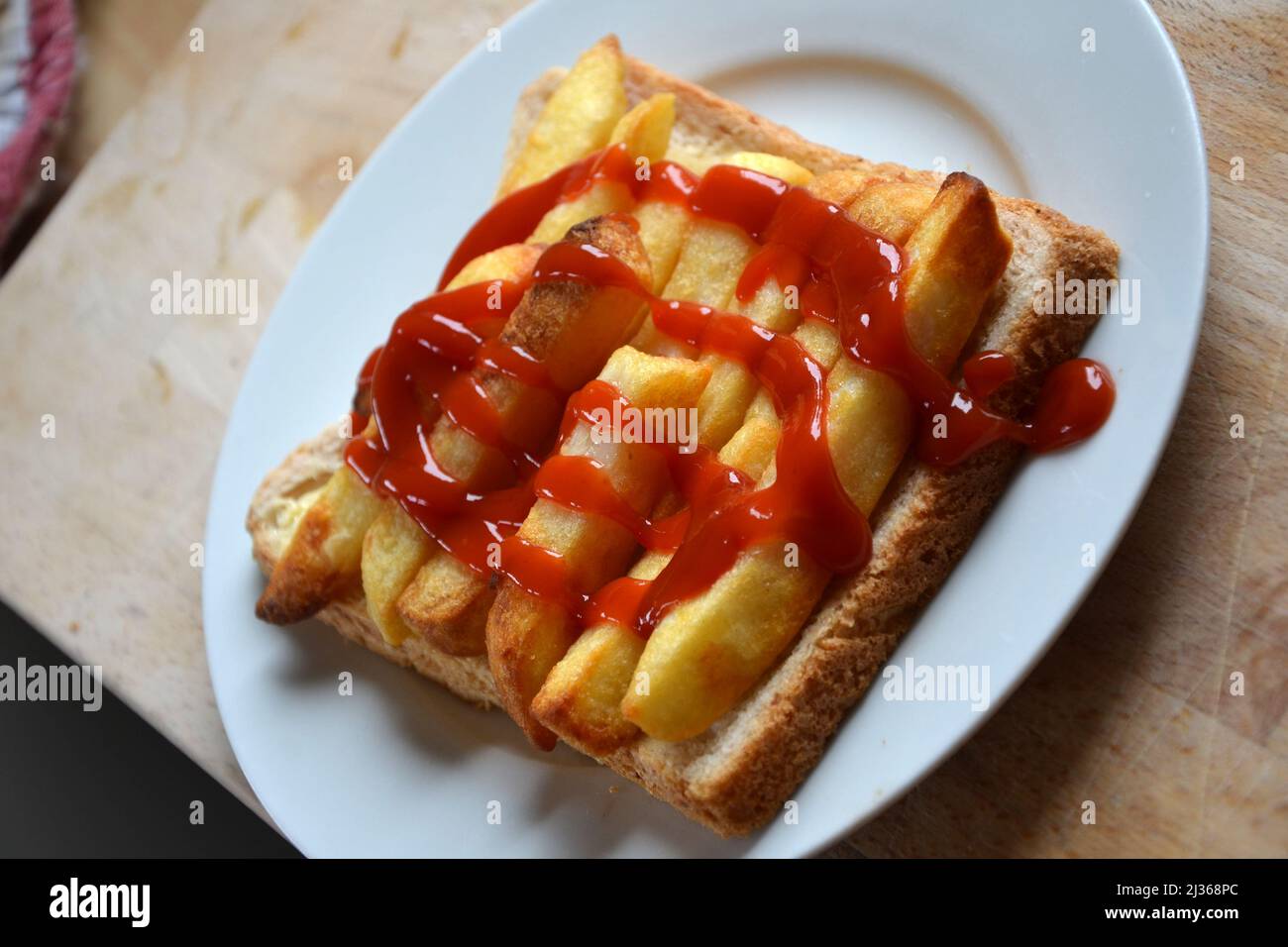 chip sandwich, chip butty, fast food Stock Photo Alamy