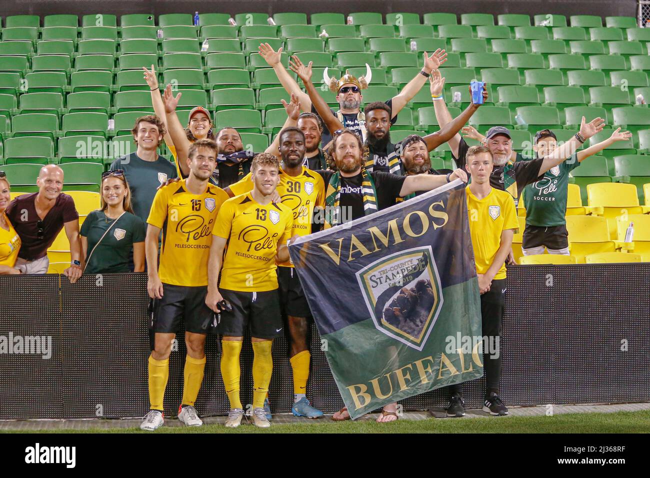 St. Petersburg, FL USA: The Villages SC fans, the Tri-County Stampede, posed with forward Daht Faal (15), midfielder Nazar Deputat (13) and forward Ma Stock Photo