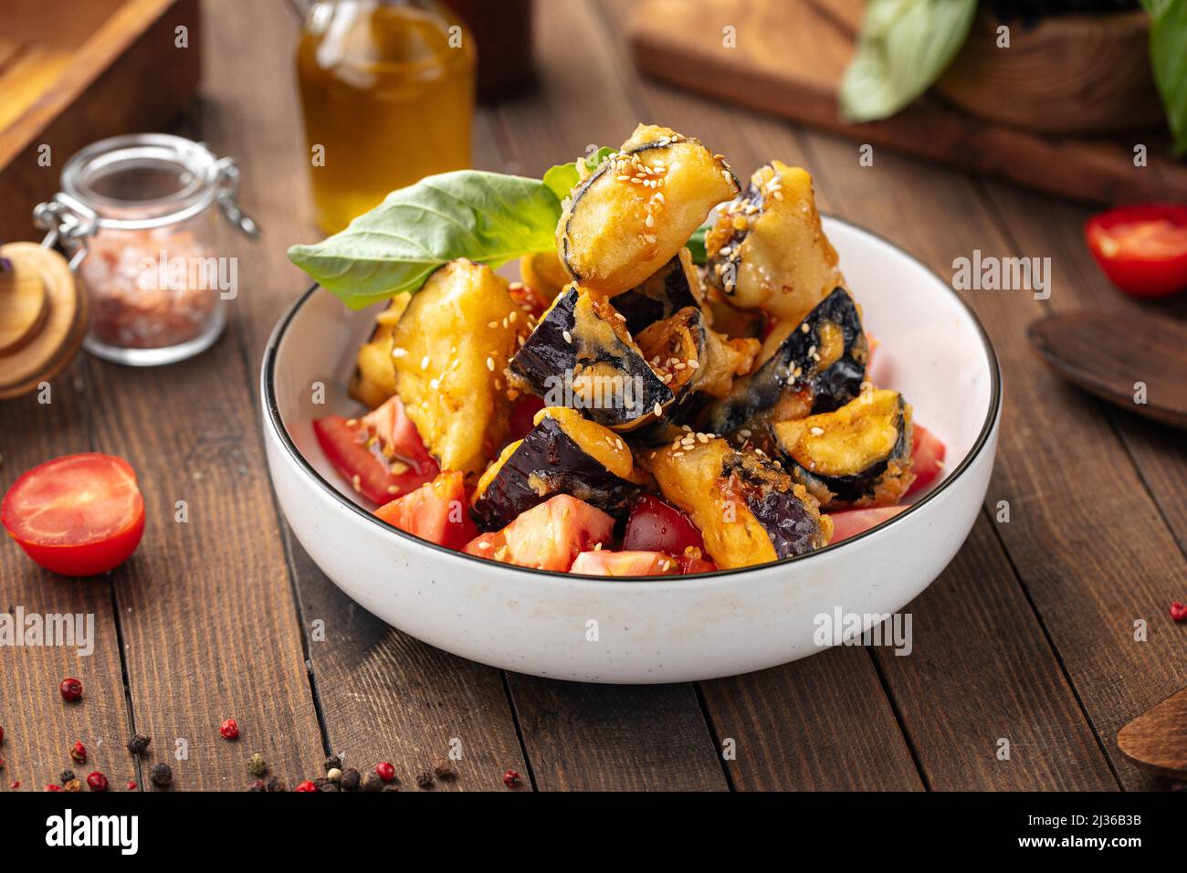 Sweet chili crispy battered eggplants salad Stock Photo Alamy
