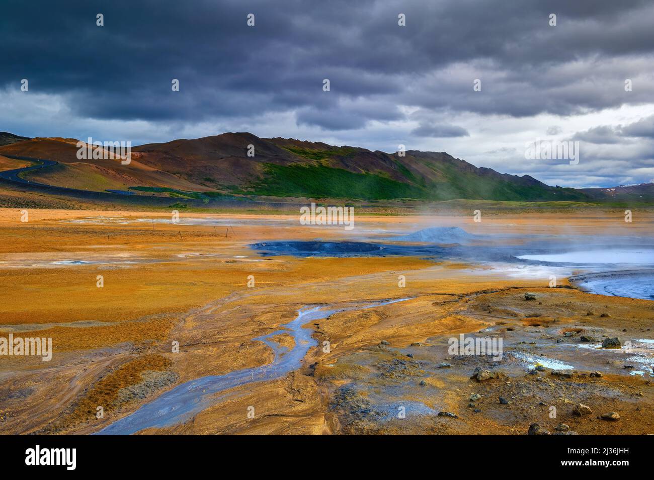 Steaming mud pools in the Hverir geothermal area in Iceland Stock Photo