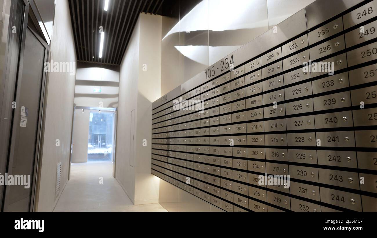 Modern entrance with mailboxes. Empty lobby of an apartment building
