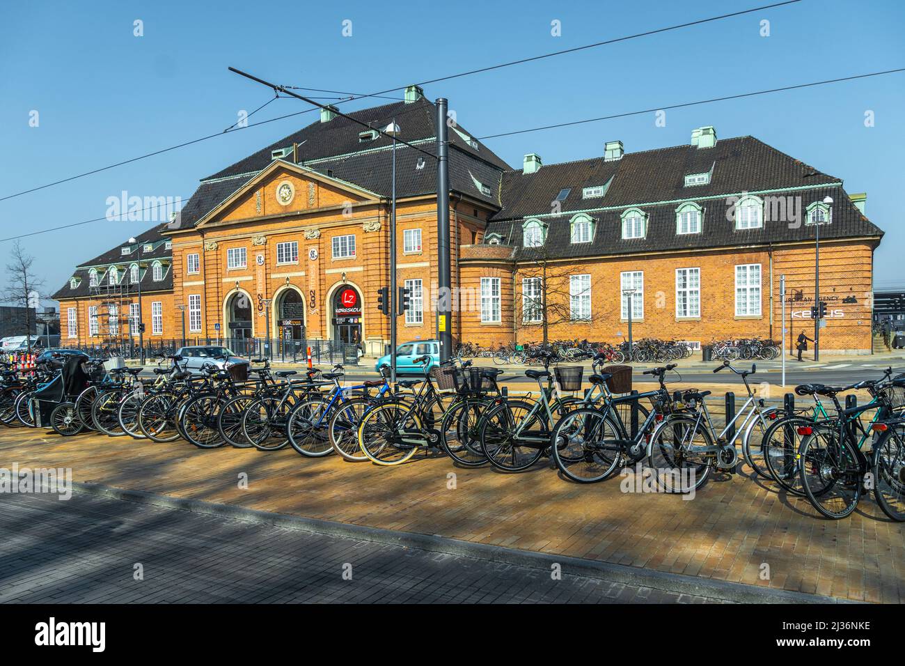 Bicycle parking in front of the old Odense station. Funen, Odense, Denmark Stock Photo