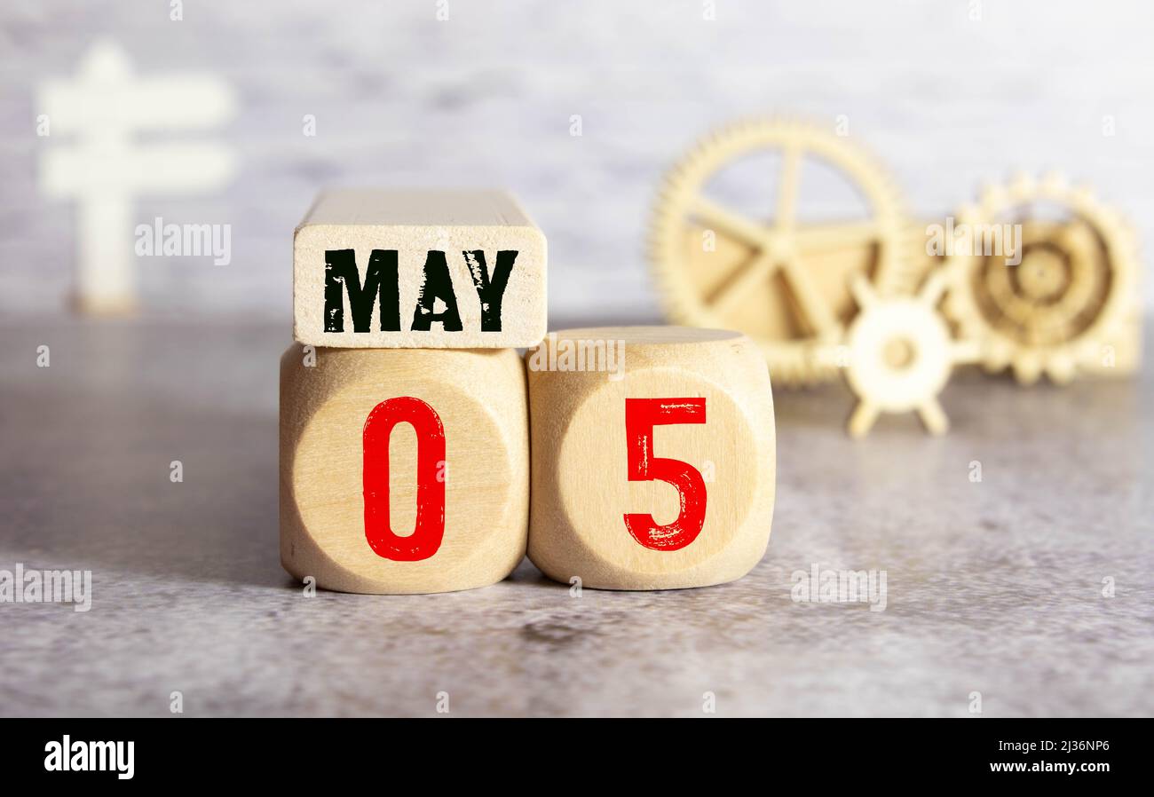 May 5th. Image of may 5 wooden color calendar on white background ...