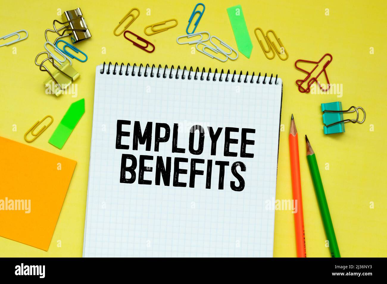 Business concept. Notebook with text Employee Benefits sheet of white ...