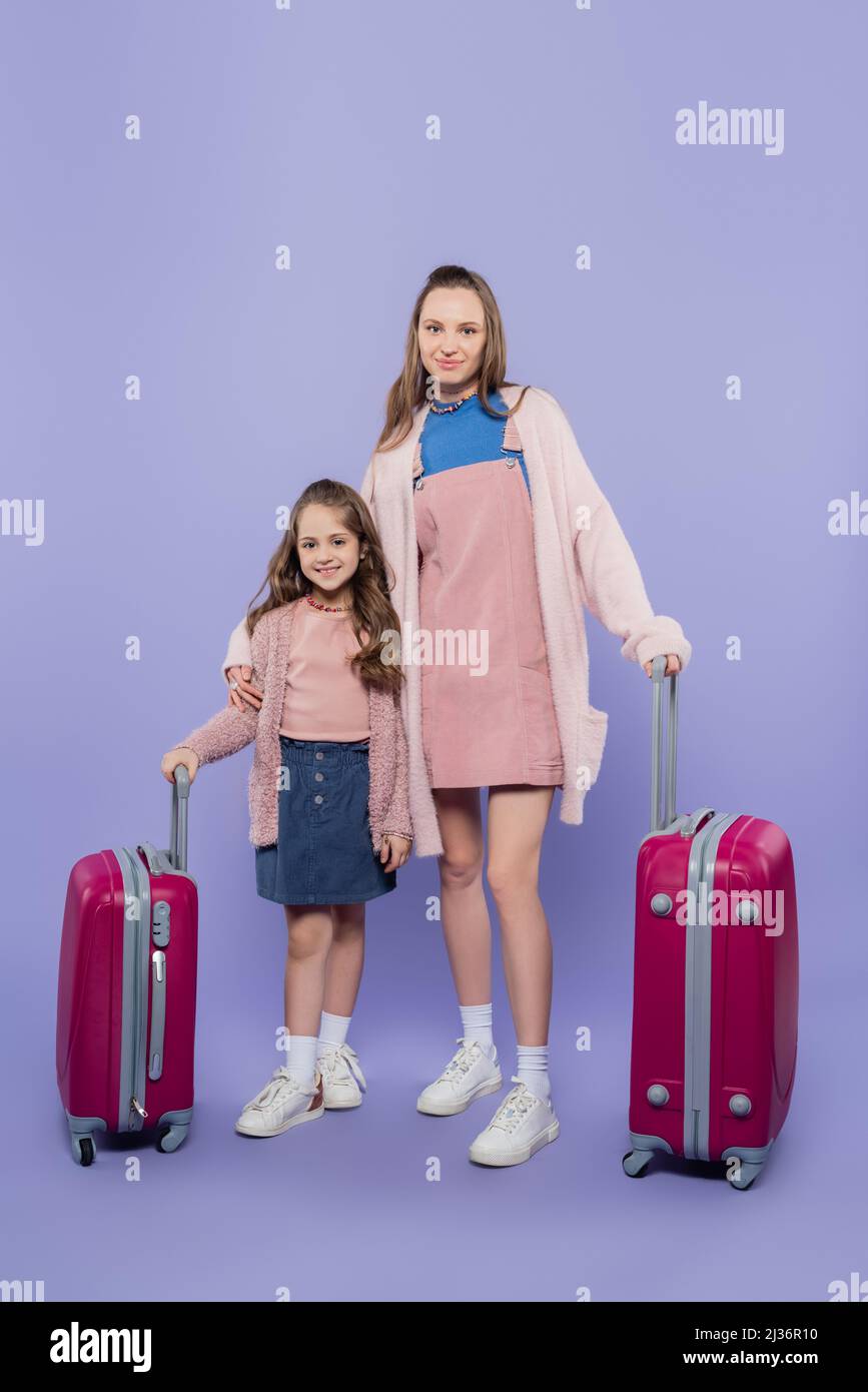 Happy tourists standing near hi-res stock photography and images - Alamy