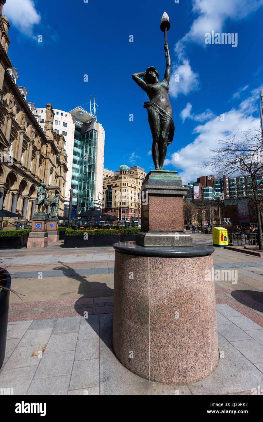Leeds City Square with one of the Nymph statues by Alfred Drury, she is one of the Nymphs called Even with her hand to her head the others being Morn. Stock Photo