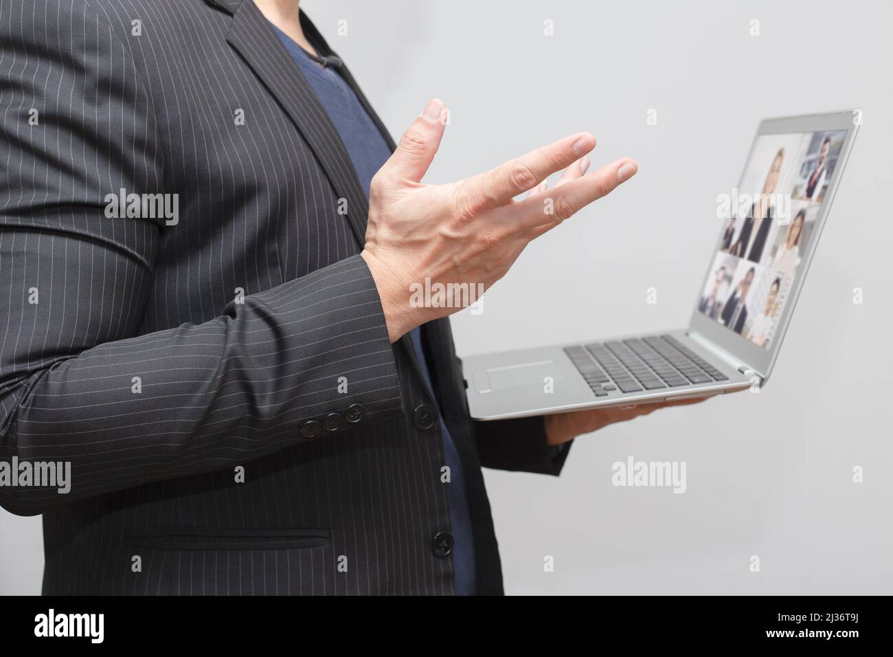 business man online meeting video call with team working distanc concept. Stock Photo