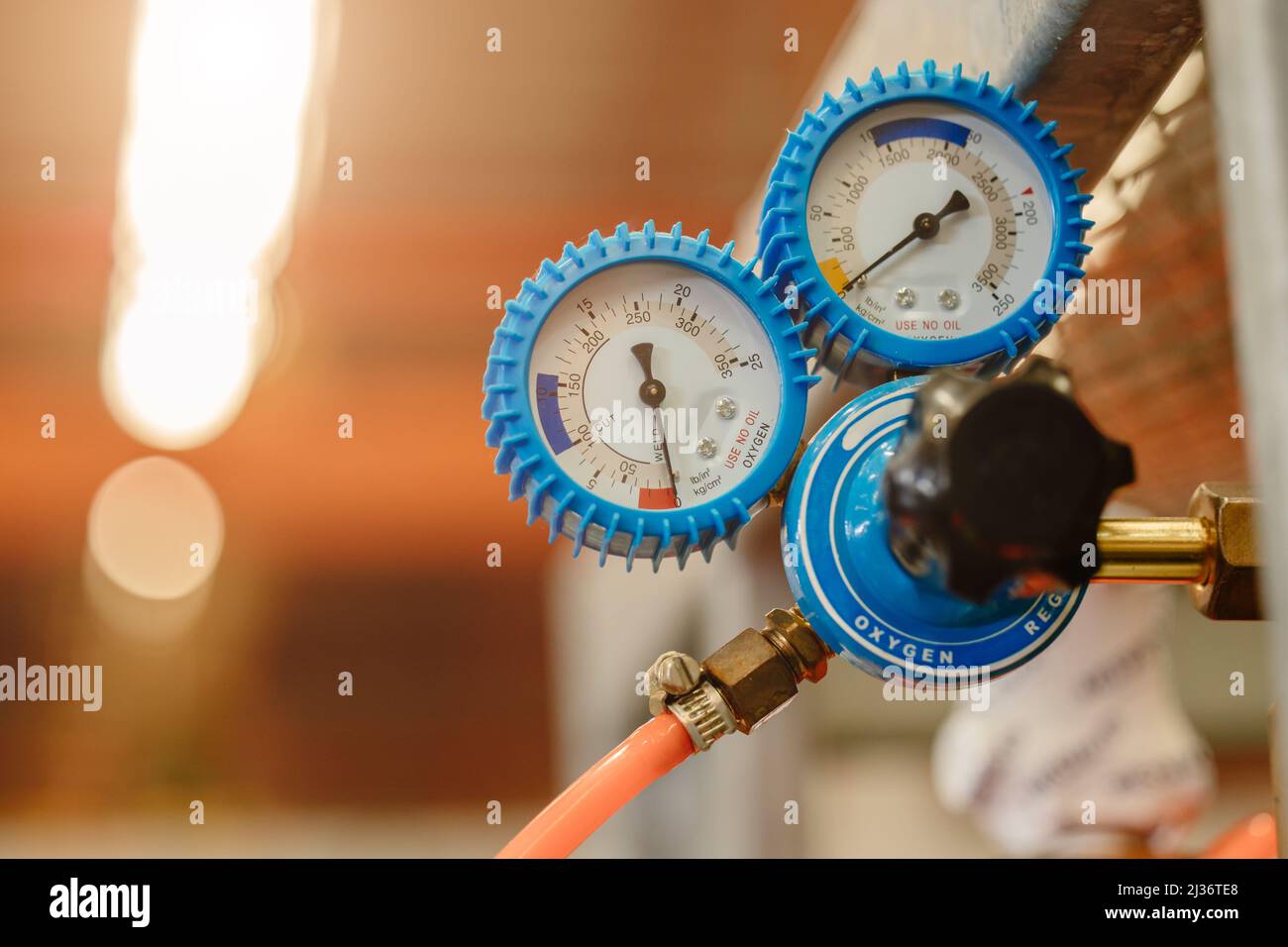 oxygen pressure gauge regulator monitor for laser cutting machine metal factory Stock Photo