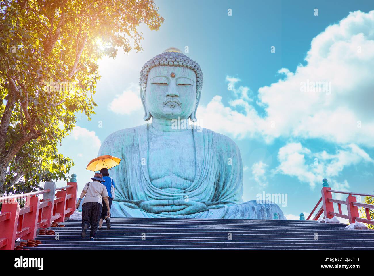 The Great Buddha of Kamakura Daibutsu at Thai Temple - Wat Doi Prachan Mae Tha, Lampang Thailand Travel Landmark. Stock Photo