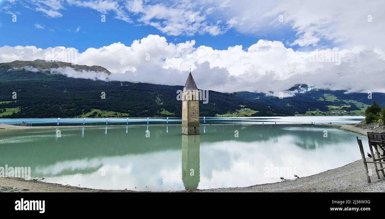Church tower submerged in water, city submerged in water Stock Photo ...