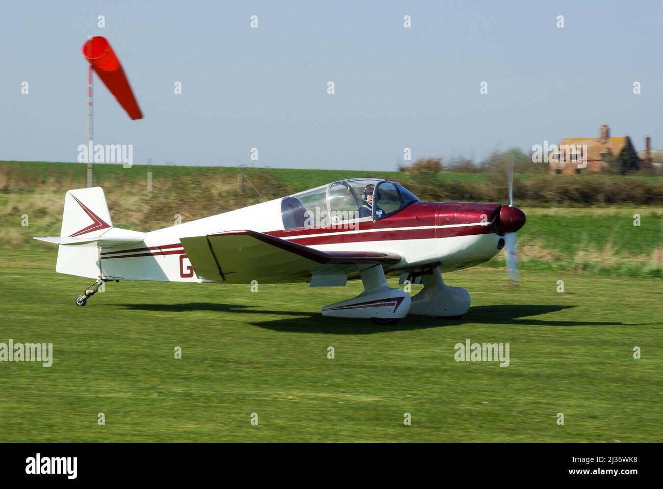 SAN Jodel DR-1050 Ambassadeur light aircraft plane G-ARRD running up for take for the air race at Great Oakley, UK. Grass airstrip on farmland Stock Photo