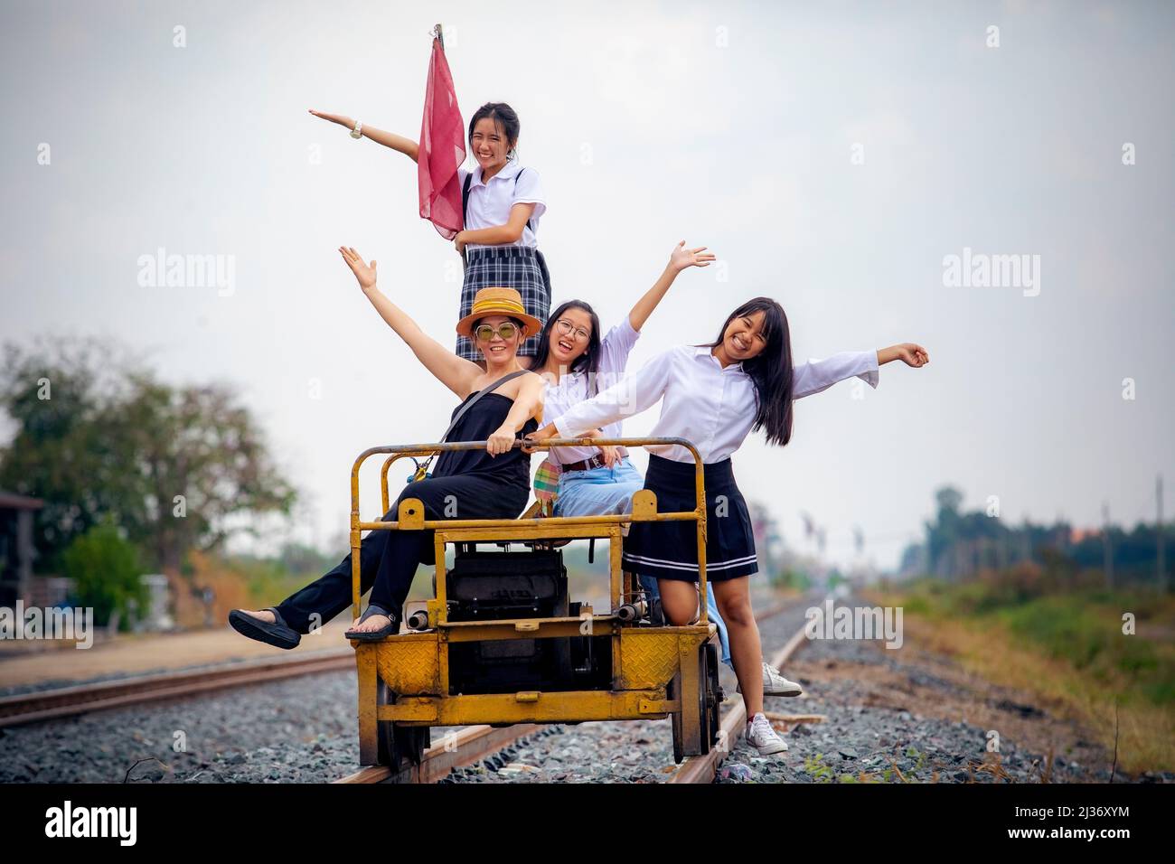 group of different asian woman happiness lifestyle on railway track Stock Photo