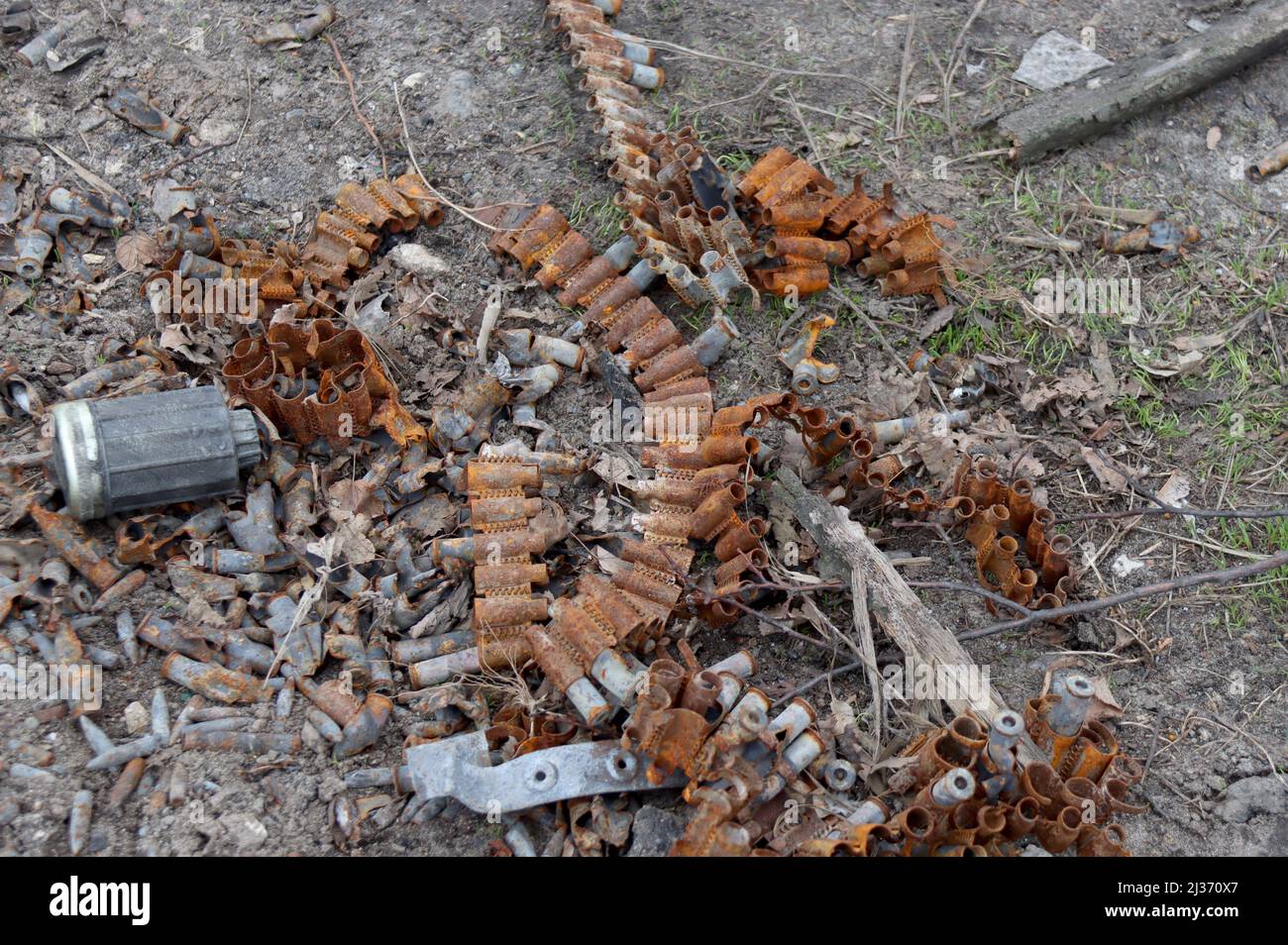 BUCHA, UKRAINE - APRIL 5, 2022 - A used ammunition belt is seen on the ground in Vokzalna Street following the liberation of the city from Russian inv Stock Photo