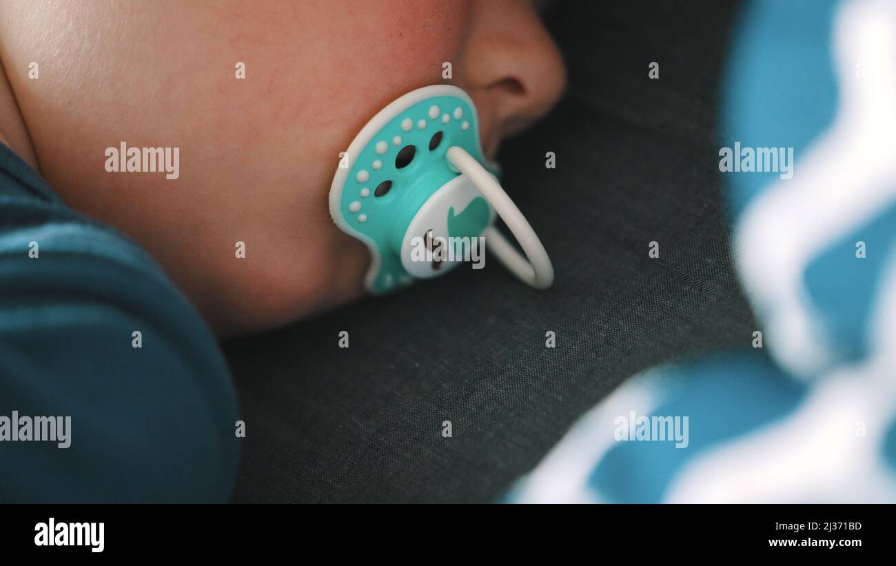 Turquoise Pacifier Infant development scale hi-res stock photography and images - Alamy