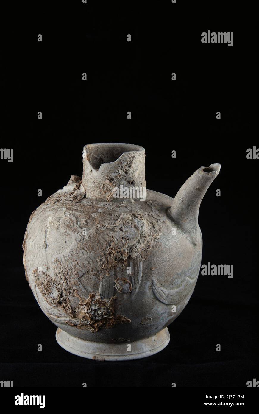 Chinese ceramic known as 'Yue ware' unwatered from 9th-10th century Cirebon shipwreck found in 2003 in Java Sea north of Cirebon, West Java, Indonesia. Photographed at the Directorate of Underwater Archaeology, Indonesia's Ministry of Culture and Tourism in Jakarta, Indonesia. Stock Photo