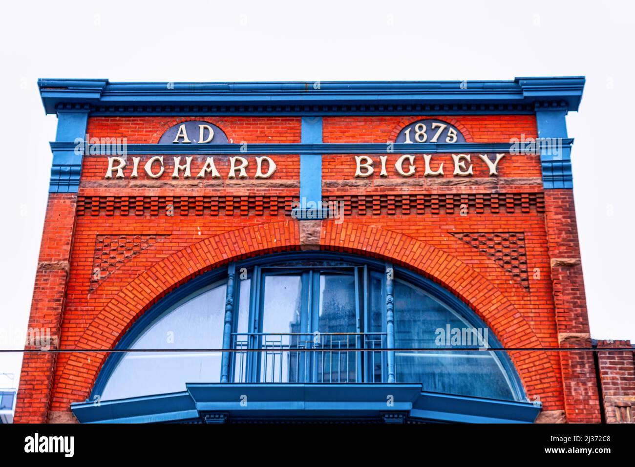 Colonial architecture detail with an arched structure of the Richard Bigley building which was constructed in 1873. The landmark is seen in Queen St. Stock Photo