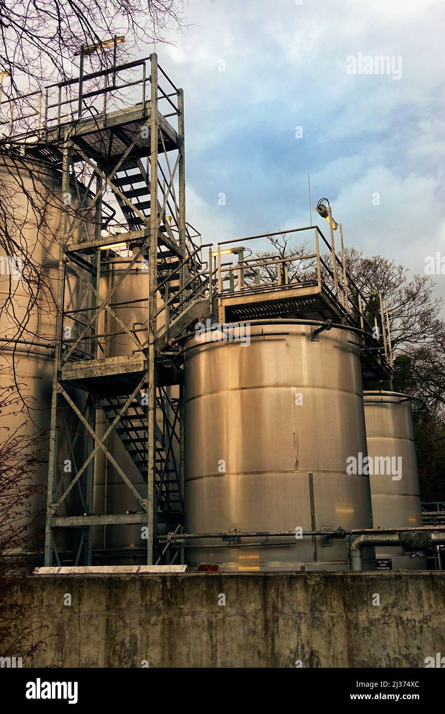 Large steel industrial vats or containers for gas or chemicals, with walkways and gantries, in