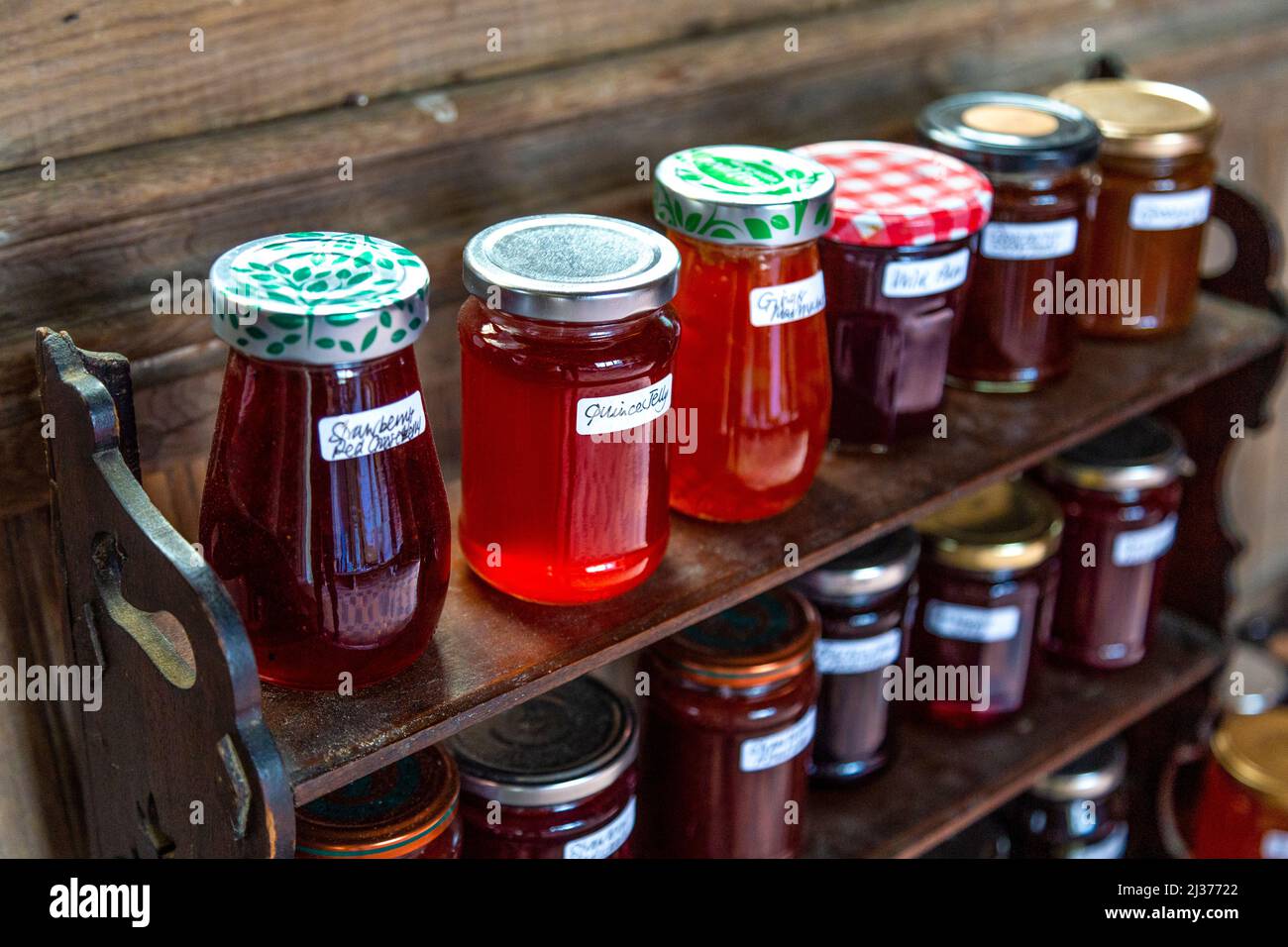 Home-made jams and preserves (honesty box at the porch of St Mary The Virgin church in Great Wymondley, Hertfordshire, UK) Stock Photo