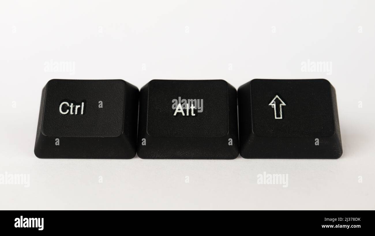 Ctrl Alt Shift shortcut created with keyboard keys isolated on white background, white Ctrl Alt Shift on black keyboard, top view Stock Photo