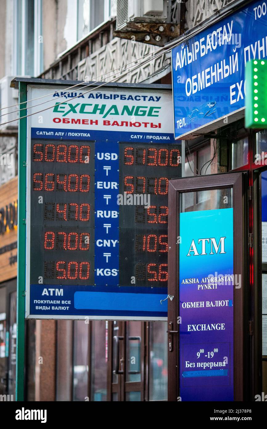 Currency exchange office ATM with an electronic display at the entrance in Almaty. Almaty, Kazakhstan - March 21, 2021 Stock Photo