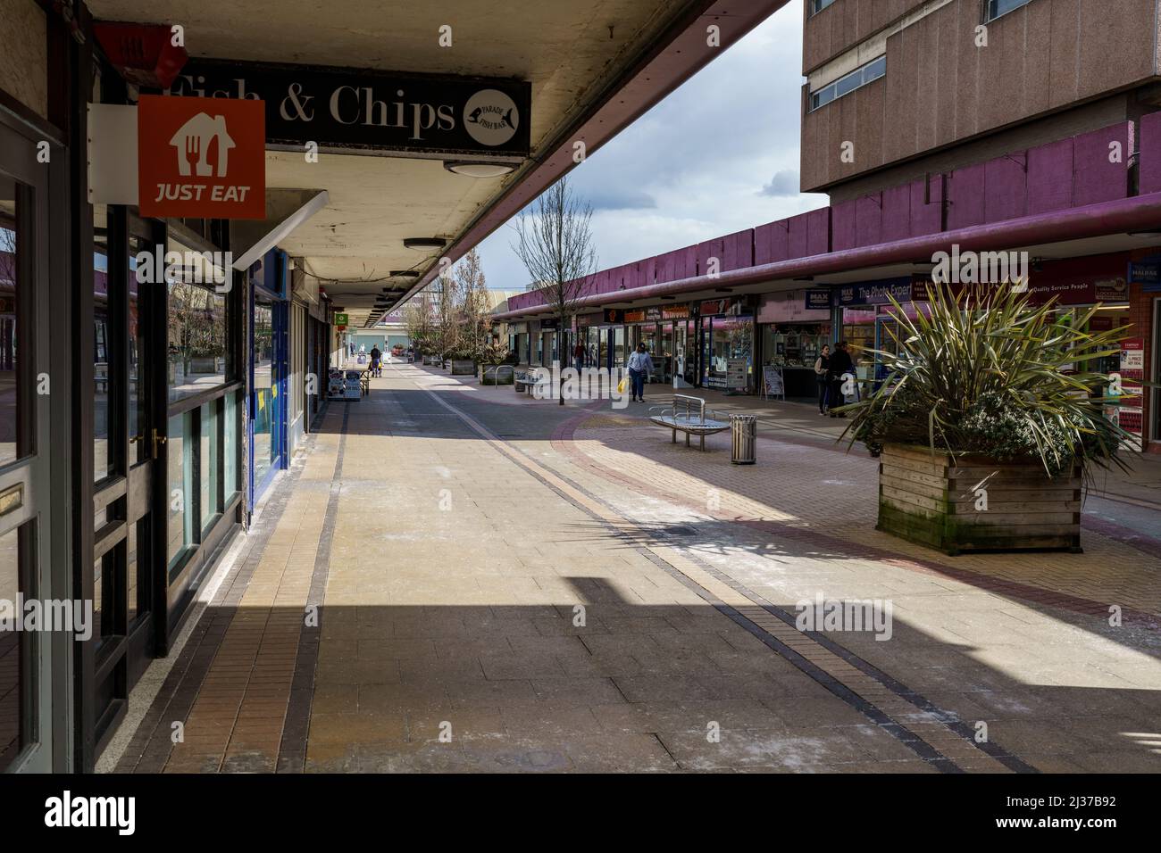 Swinton town centre shopping precinct and shoppers walking through arcade Stock Photo