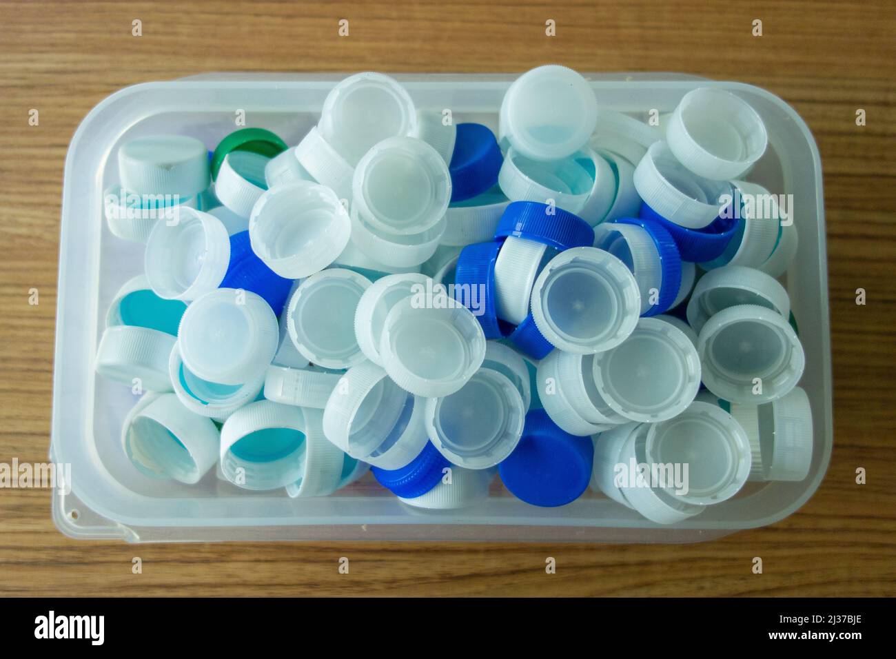 Colorful plastic bottle caps. Collecting plastic for recycling and reuse Stock Photo Alamy