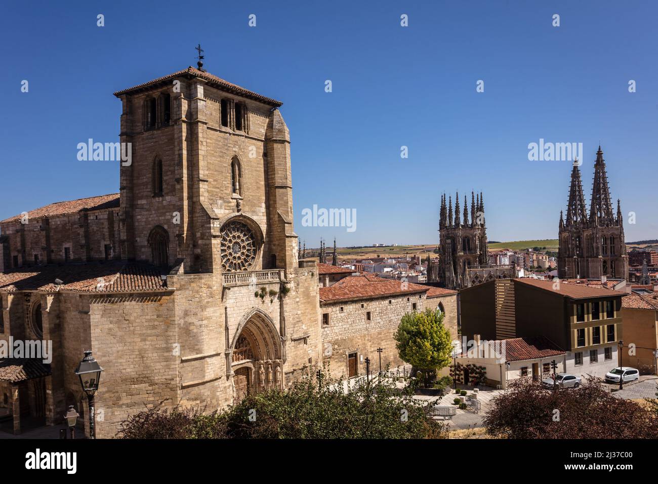The Catholic church San Nicolas de Bari and the Gothic Cathedral of Saint Mary of Burgos, Spain. Stock Photo