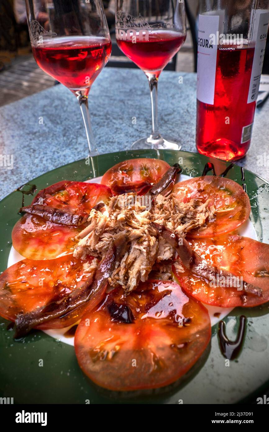 Spain-Basque Country-Guipuzcoa- FOOD: ''Ensalada de tomates con anchoas y bonito del Norte'', at Guetaria., Stock Photo