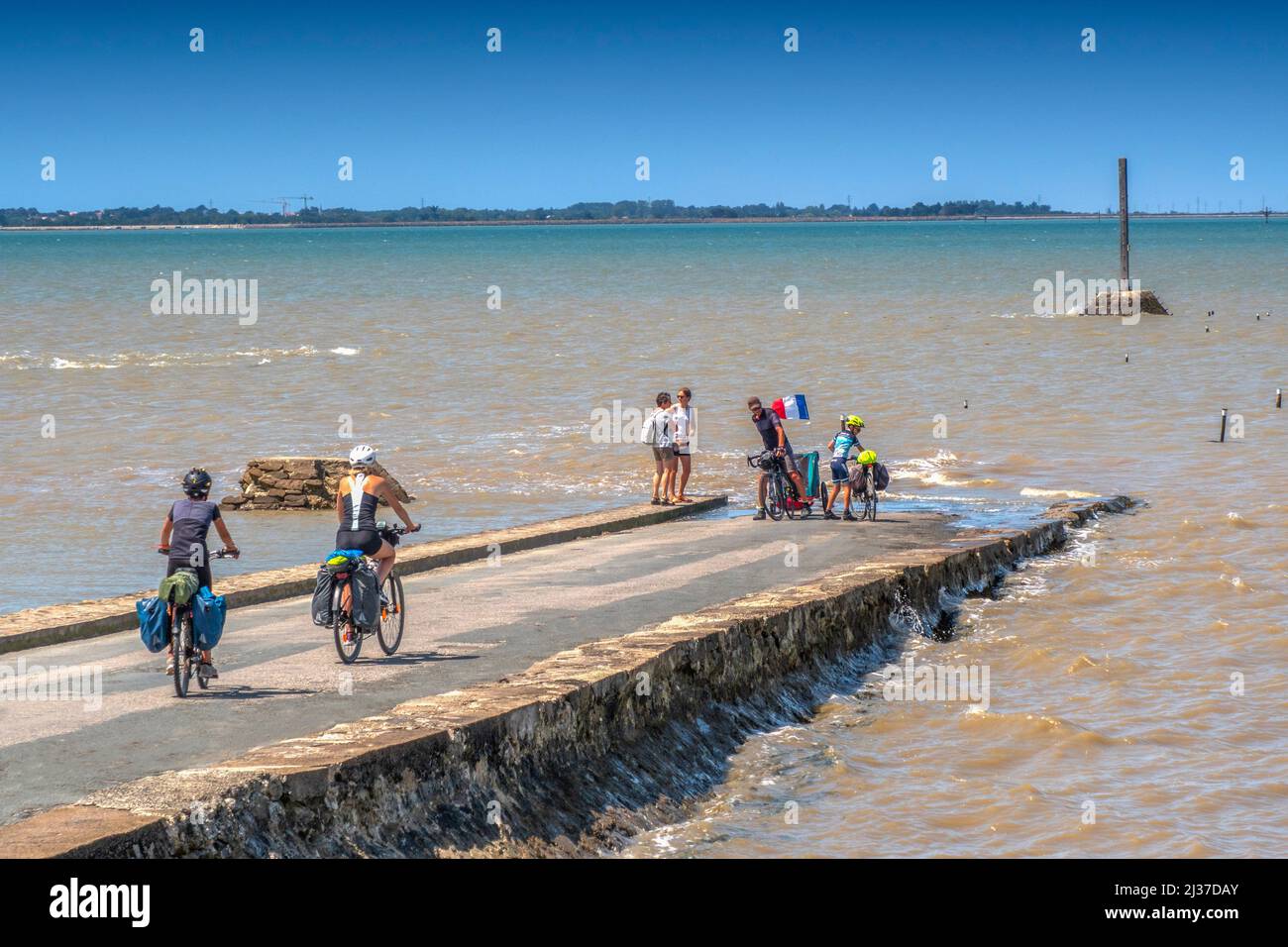 France-Pays de Loire-Vendée- when the tide is covering the ''Gois'' road, going from the main land to the Islnd of Noirmoutier. Stock Photo
