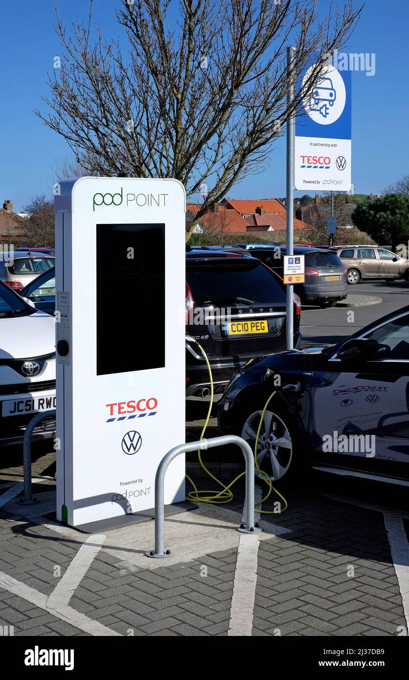 electric car charging point, tesco carpark, sheringham, norfolk, england Stock Photo
