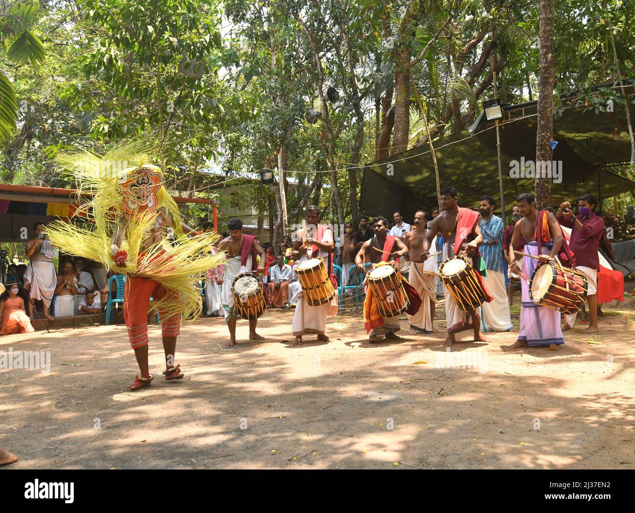 Theyyam is a popular form of dance worship in Kerala and Karnataka.Theyyam consists of thousand year old traditions,rituals and custom Stock Photo