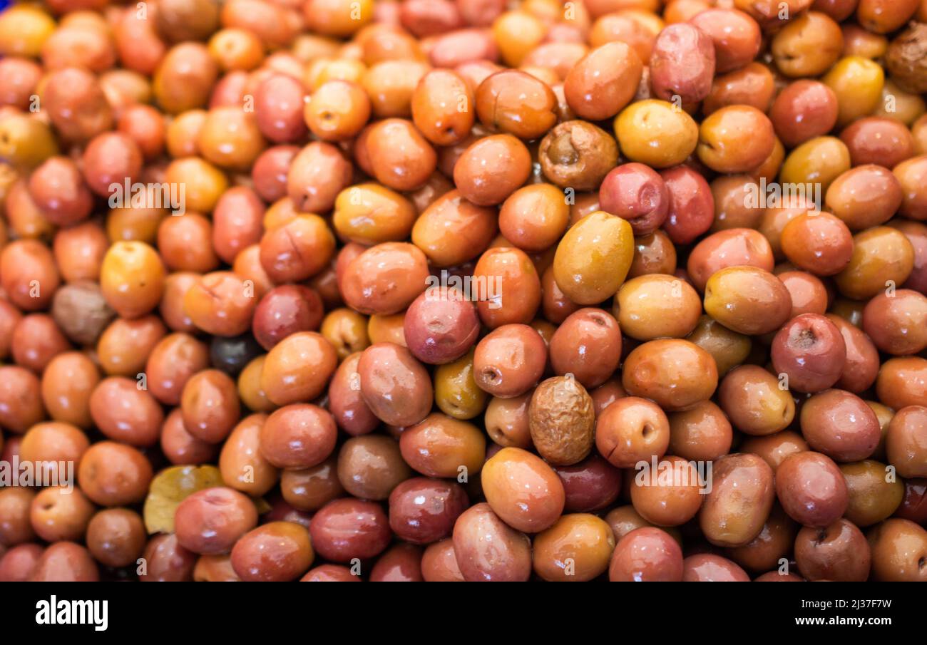 Green olives as health food preserved in olive oil Stock Photo Alamy