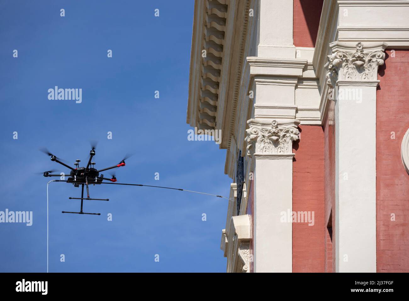 Cleaning the facade of the Hôtel du Palais in Biarritz using a drone (Atlantic Pyrenees - France). Stock Photo