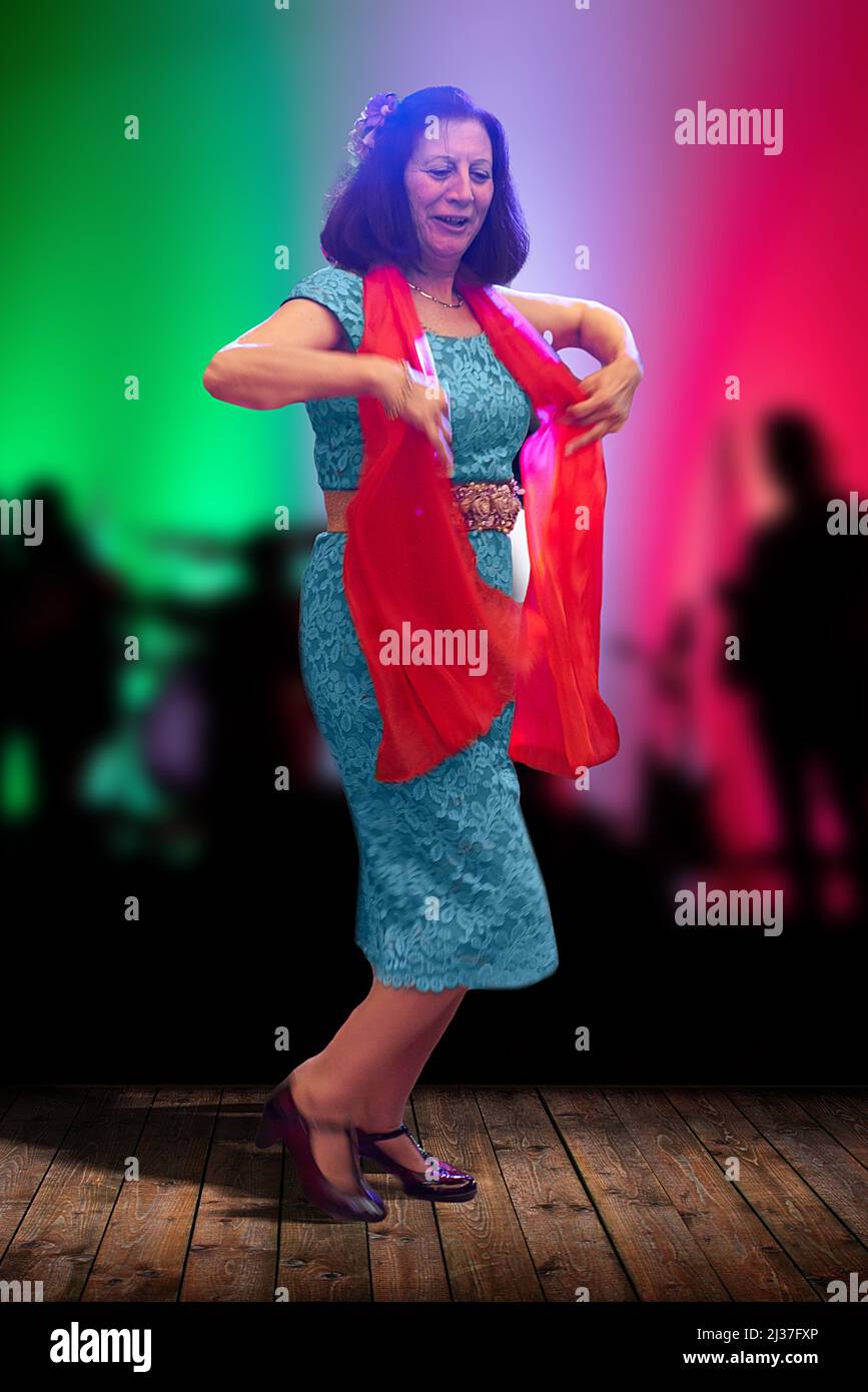 One mature woman dancing hi-res stock photography and images - Alamy