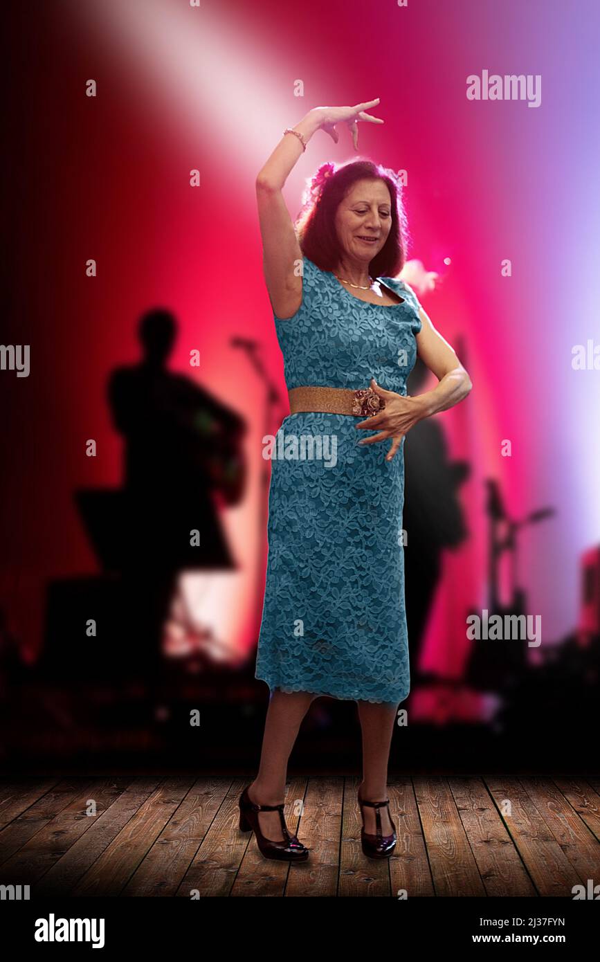 One mature woman dancing hi-res stock photography and images - Alamy