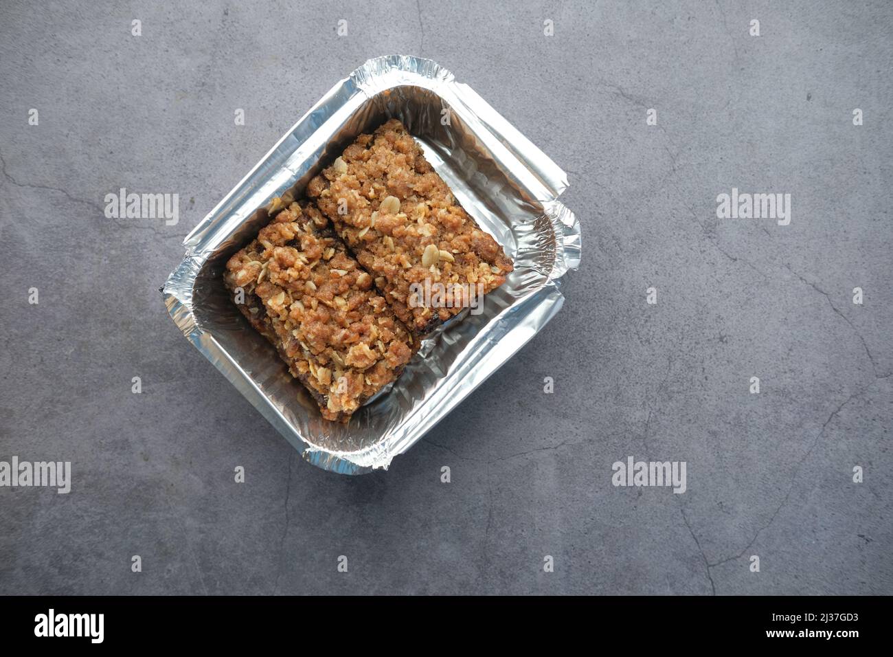 top view of date fruit chocolate bar in a take away container  Stock Photo