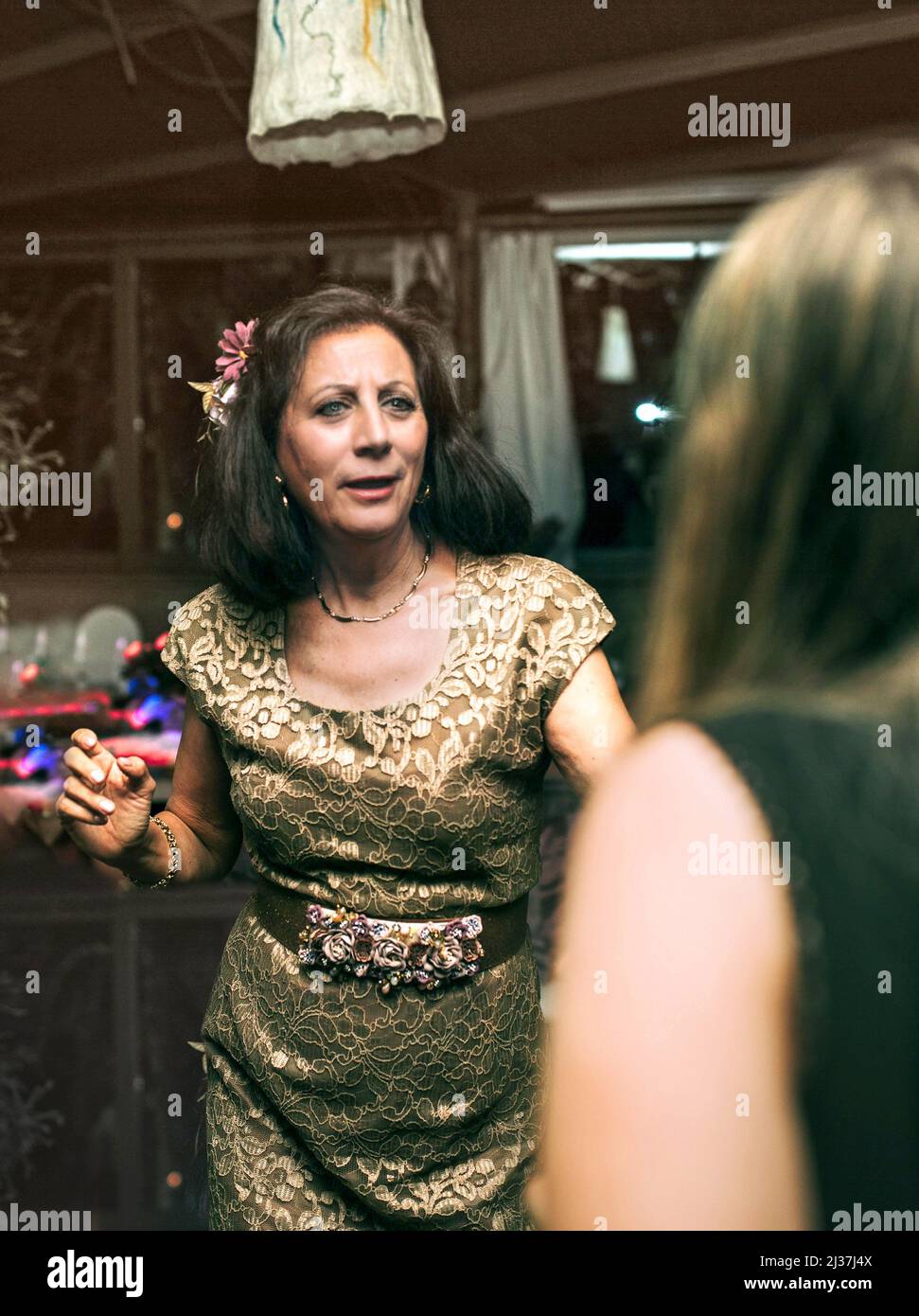 Mature woman dancing at party hi-res stock photography and images - Alamy